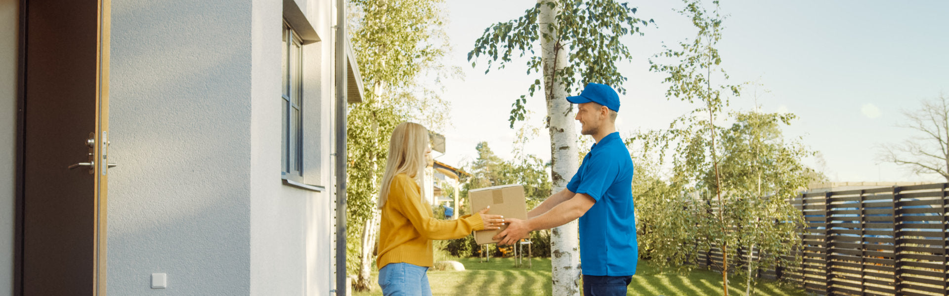 man giving box to woman