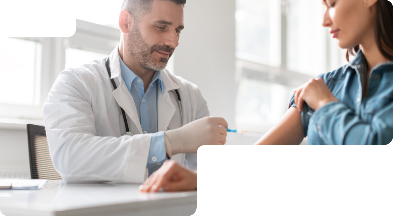 a woman getting a vaccine