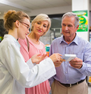 pharmacist and elderly talking