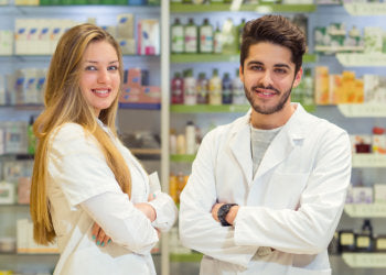 two pharmacist smiling